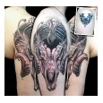 cover up tattoos_tribal bat evil ram skull coverup